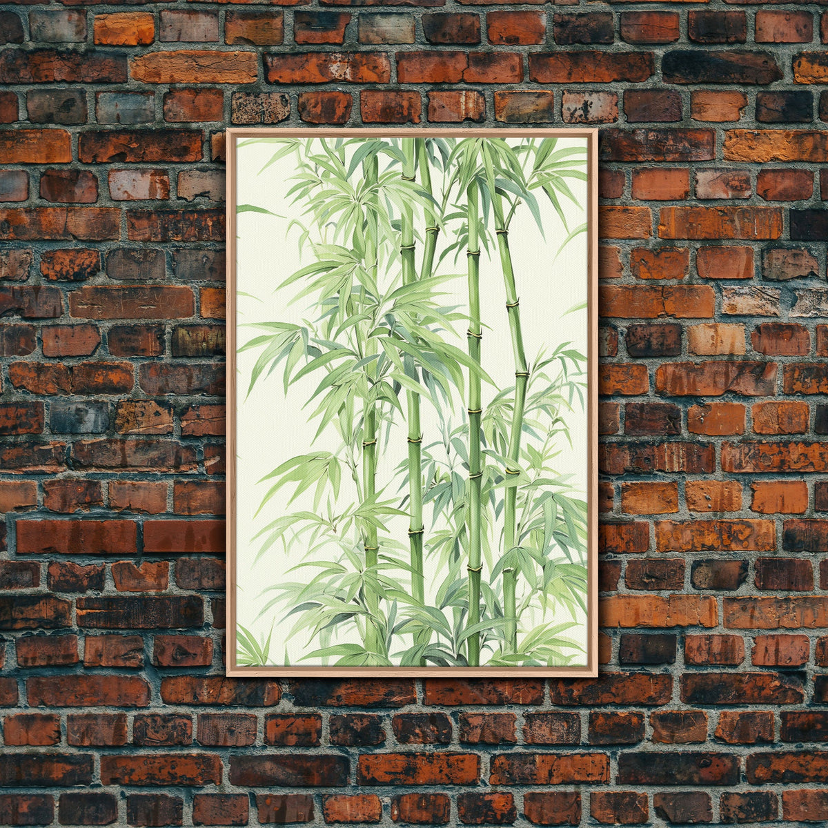 A framed botanical art print of green bamboo stalks and leaves on a cream background, displayed against a rustic red-brown brick wall.