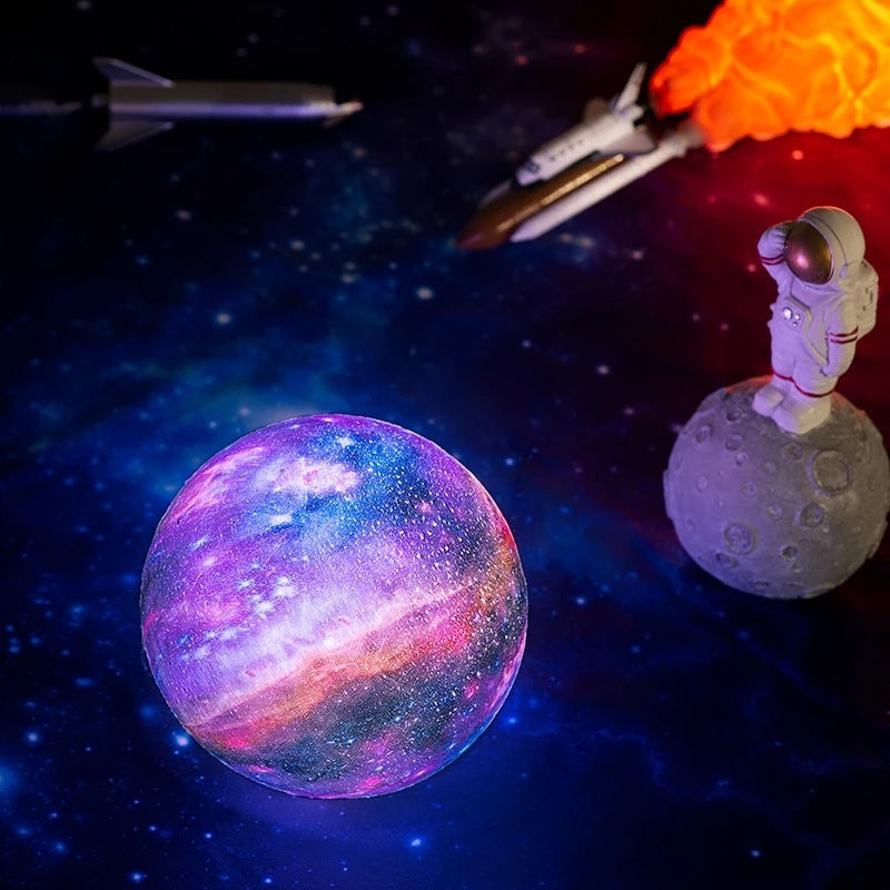 Space-themed scene with a colorful planet, moon, and rocket ship.