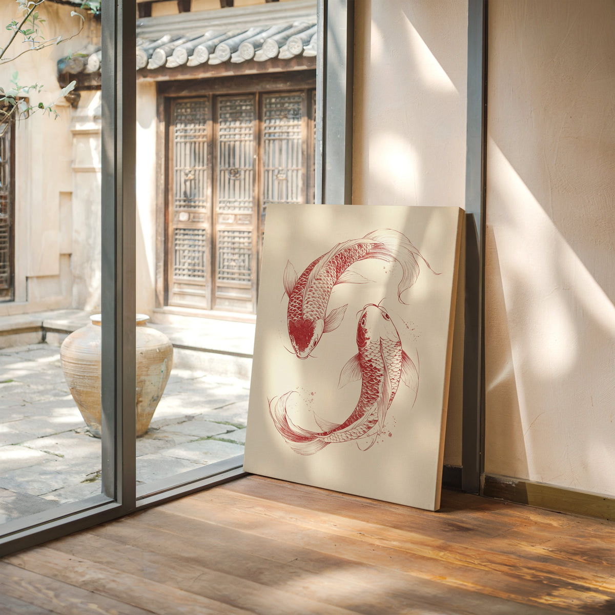 Framed artwork of two red koi fish on a neutral background, leaning against a wall.