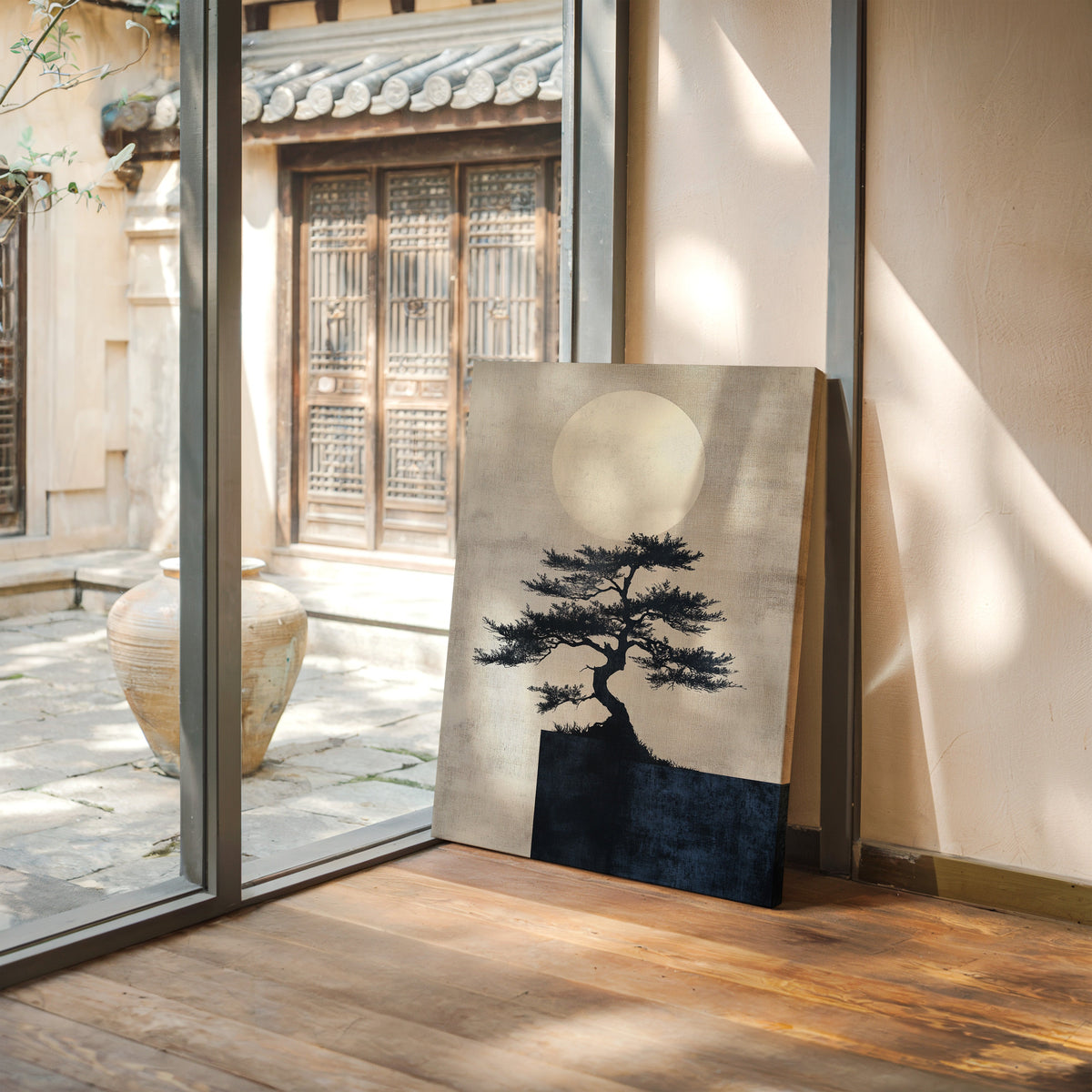 Canvas print of a bonsai tree against a moonlit sky in a room with wooden flooring and glass doors.