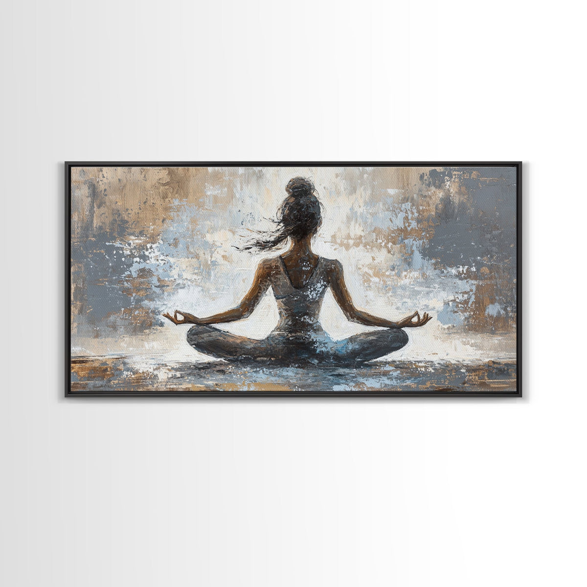 Framed artwork of a woman in a meditative pose on a textured background