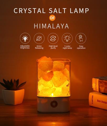 Picture of a crystal salt lamp with an lighted orange glow.
