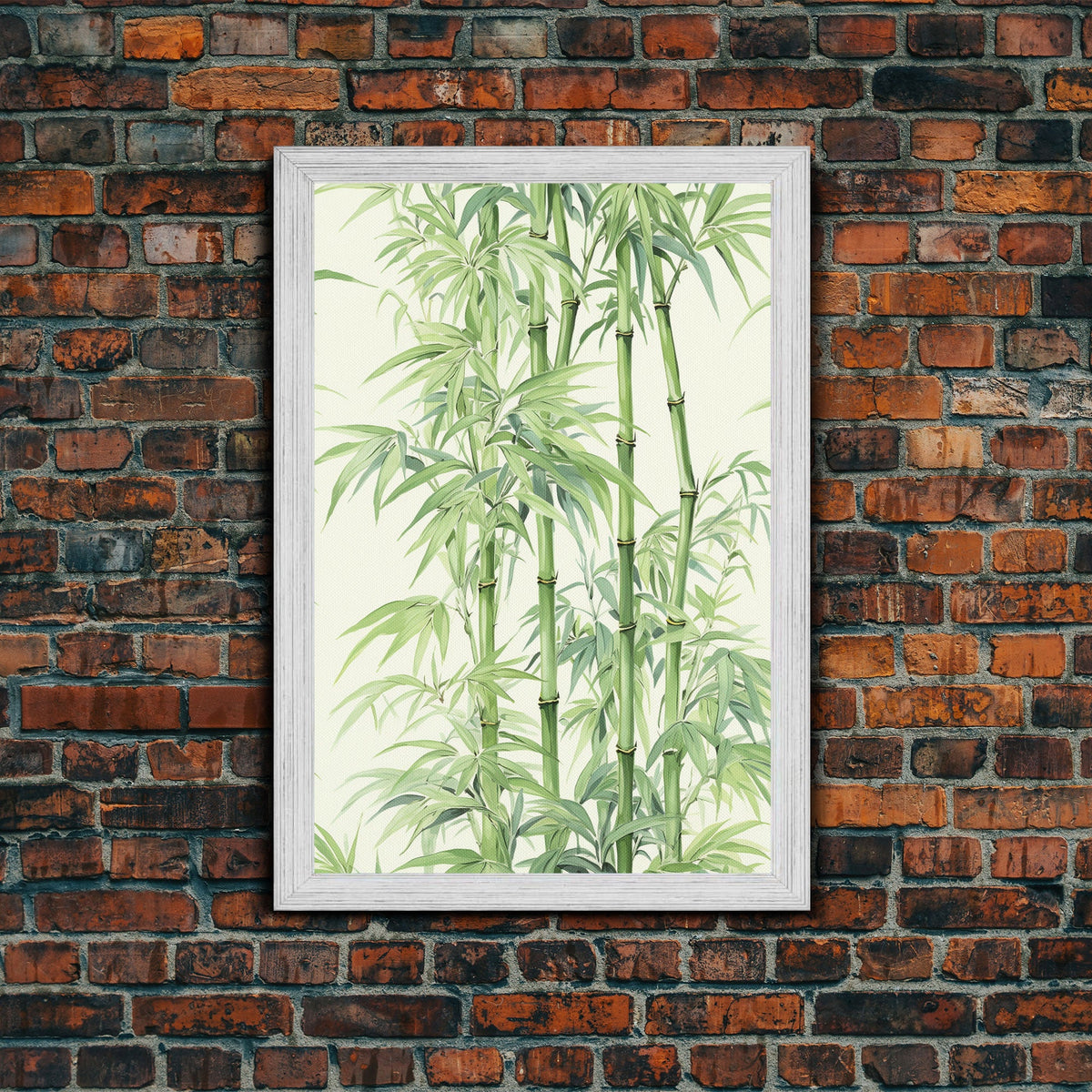 Framed artwork of bamboo against a brick wall