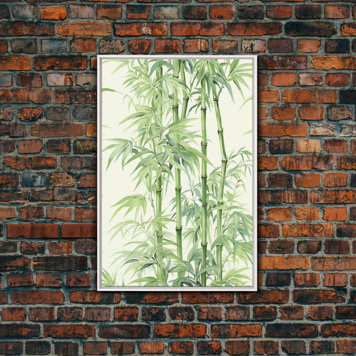 Framed artwork of bamboo against a brick wall