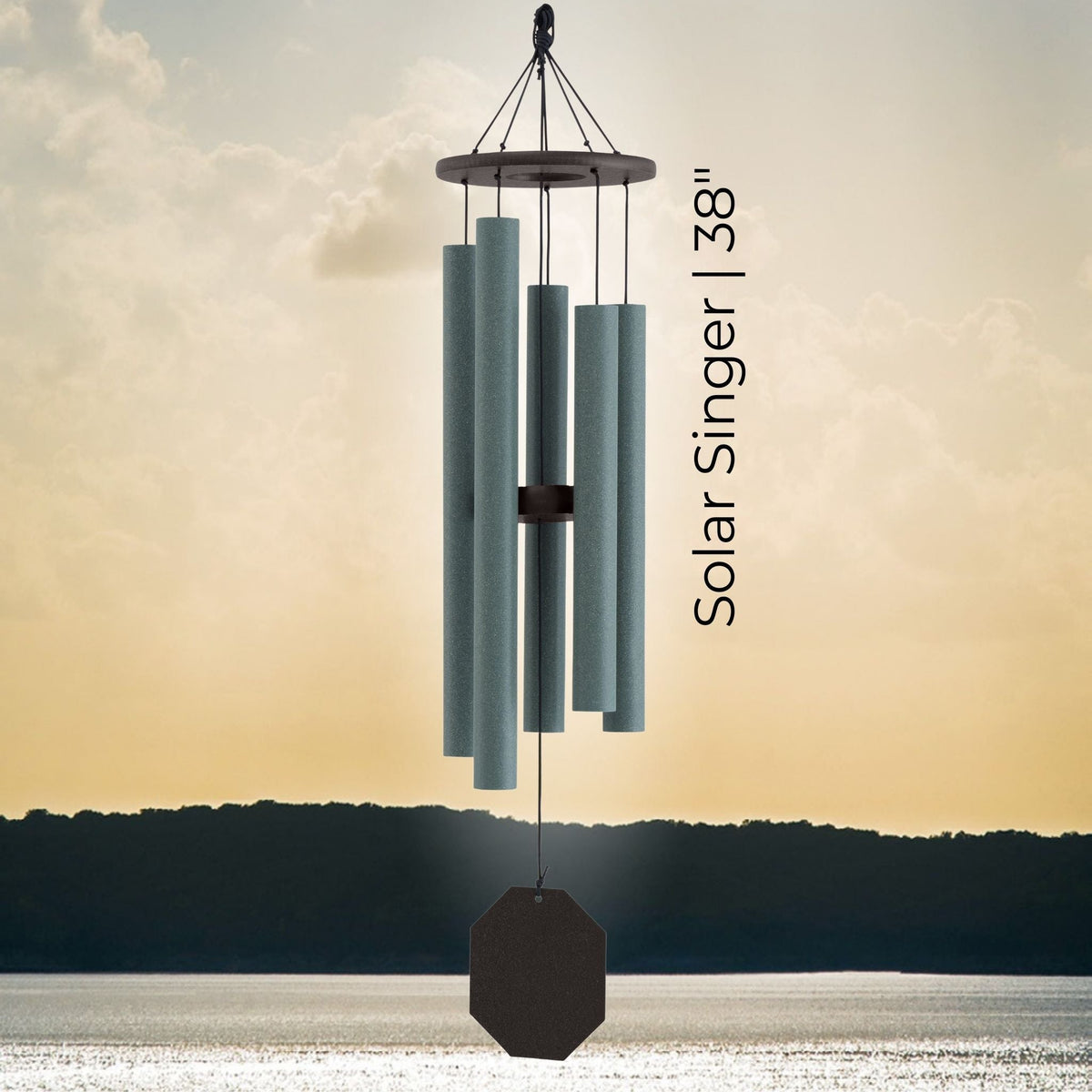 Solar-powered wind chime with 'Solar Singer 38' text against a sunset sky.