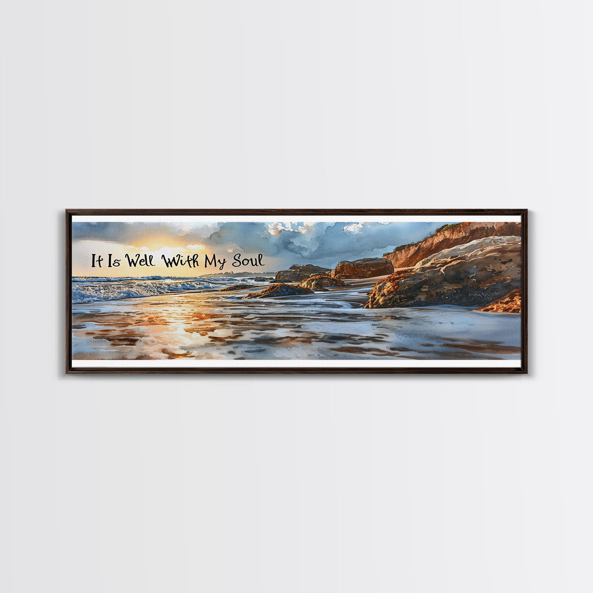 Framed artwork of a beach scene with text 'It Is Well With My Soul' on a white wall.
