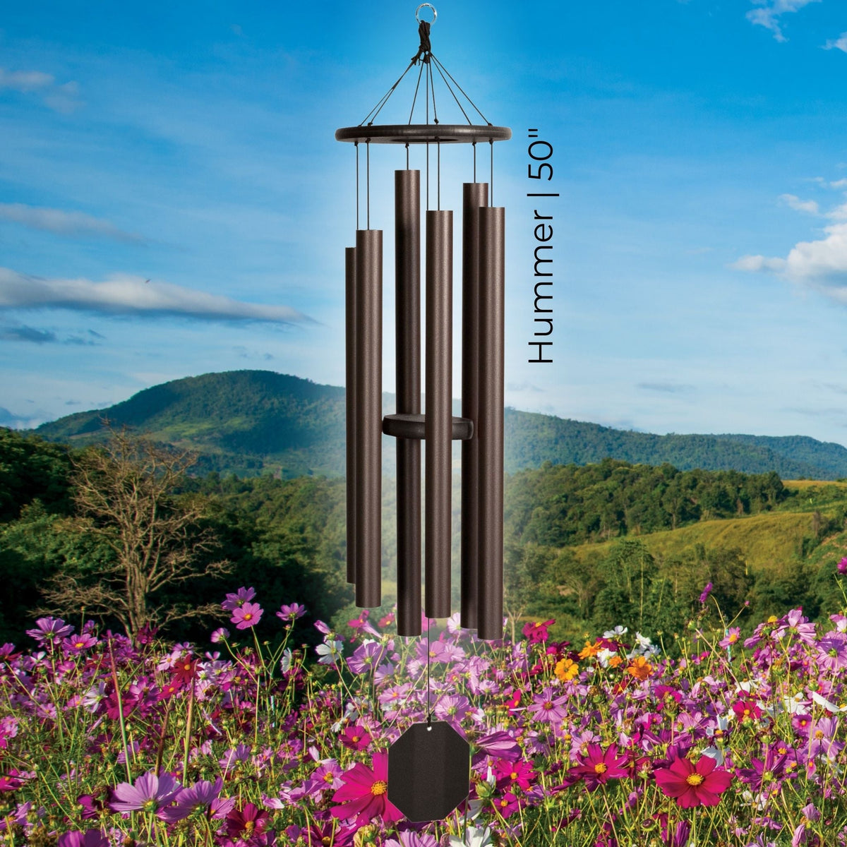 Wind chime with 'Hummer 50"' label against a scenic background of mountains and flowers.