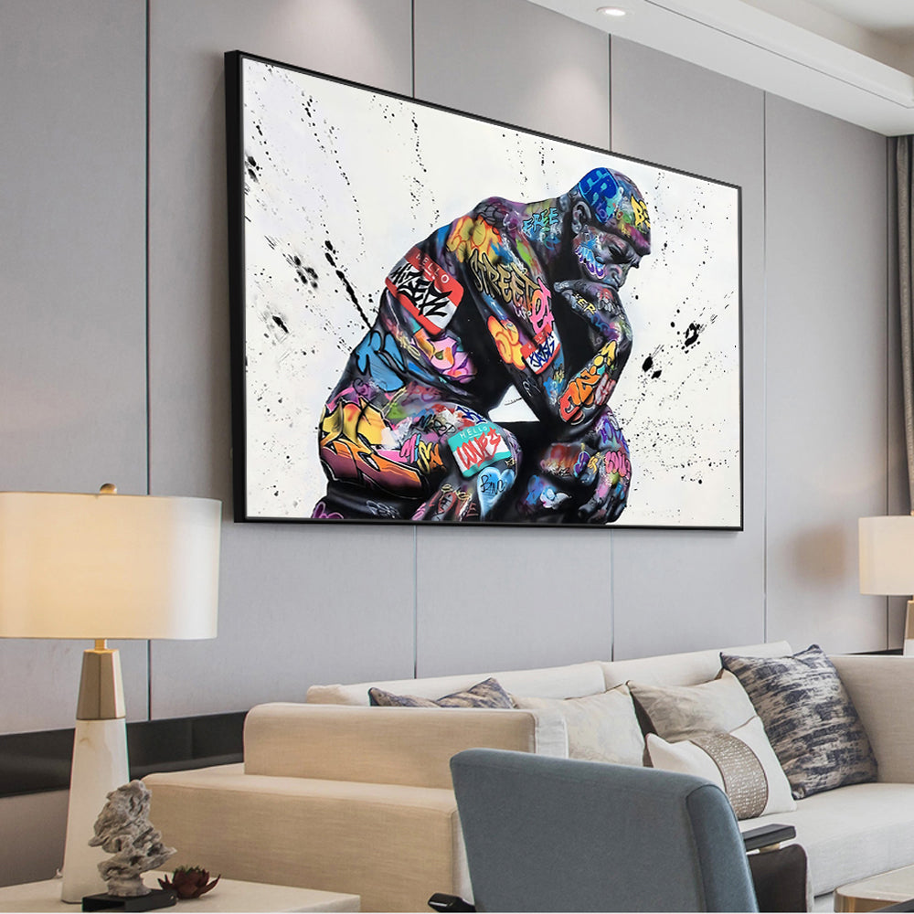 Colorful abstract painting of a gorilla on a wall in a modern living room.