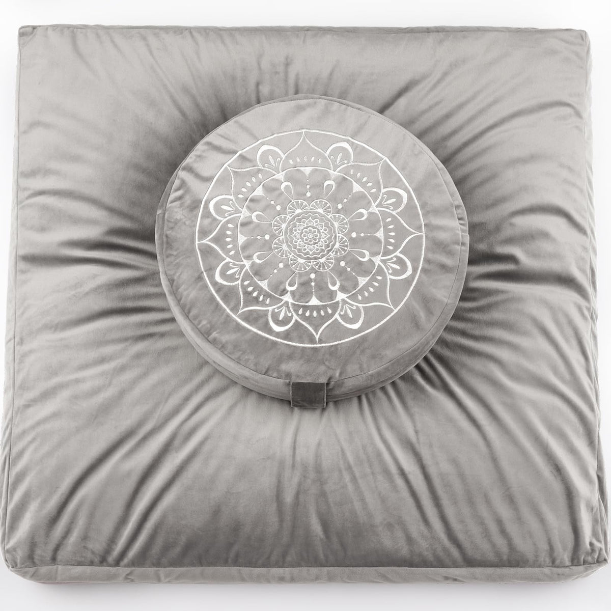 Gray meditation cushion with a circular mandala design on a white background