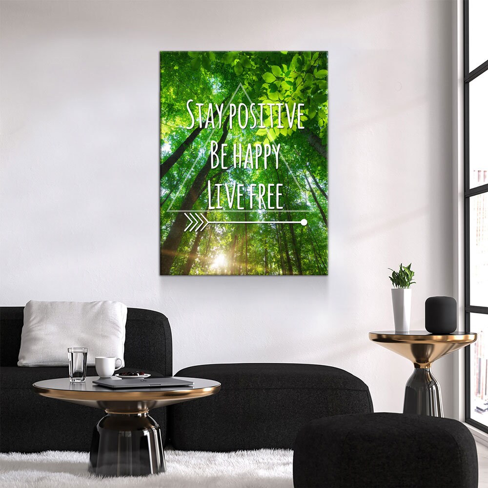 Living room with a motivational quote canvas print on the wall