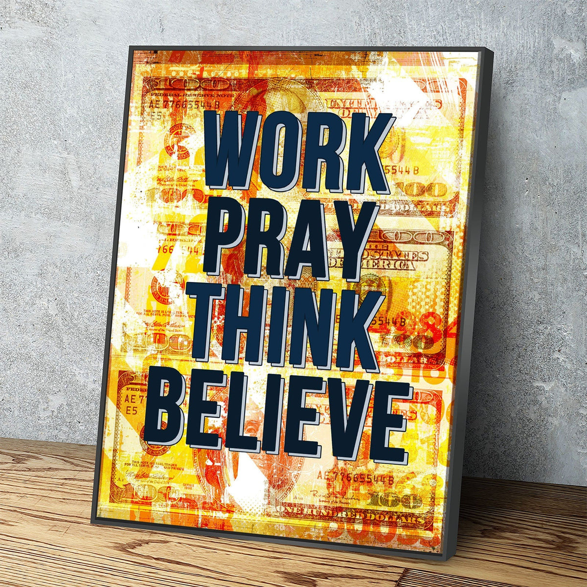 Framed motivational poster with text 'Work Pray Think Believe' on a textured wall.