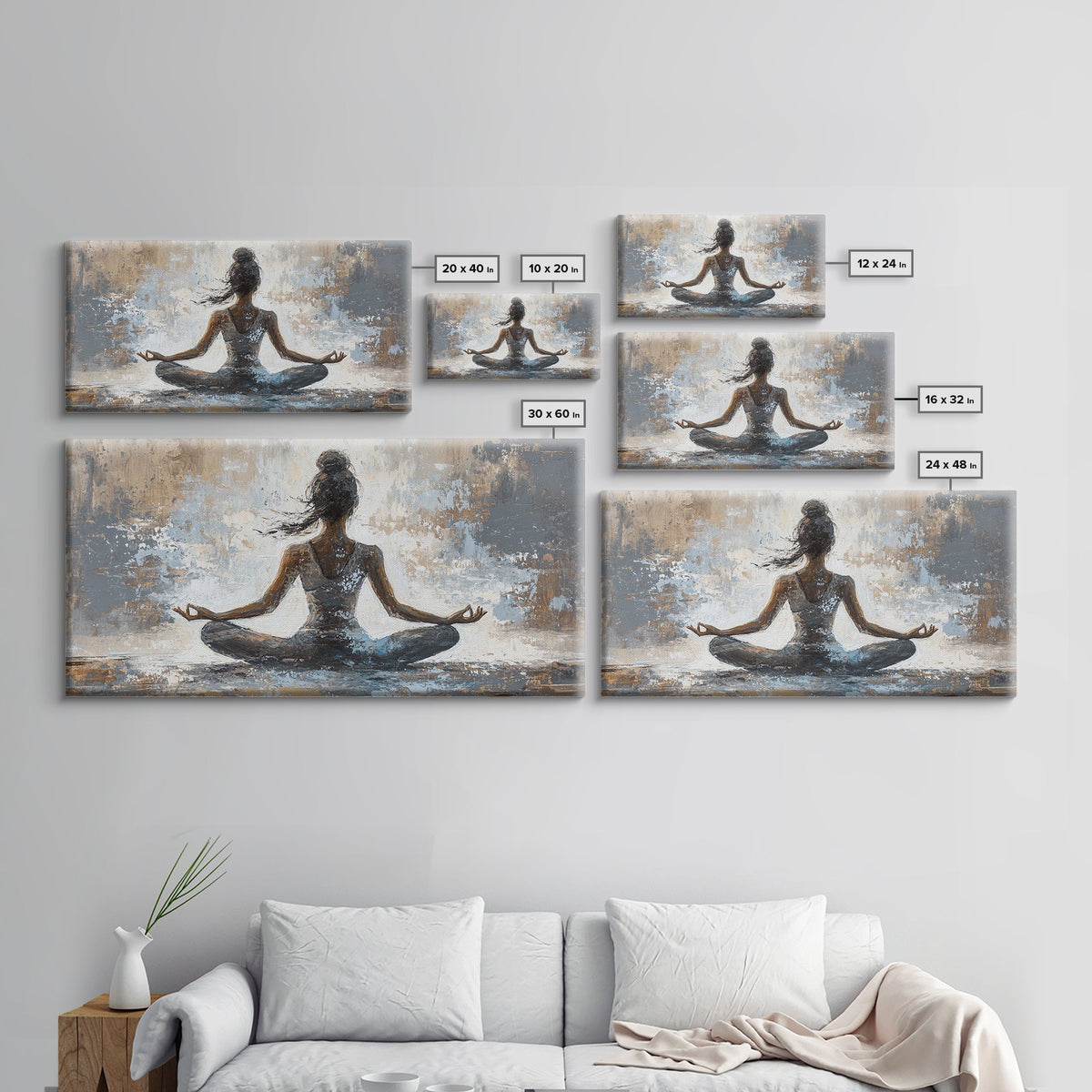 Set of six wall art prints of a woman in a meditative pose on a gray wall above a sofa.