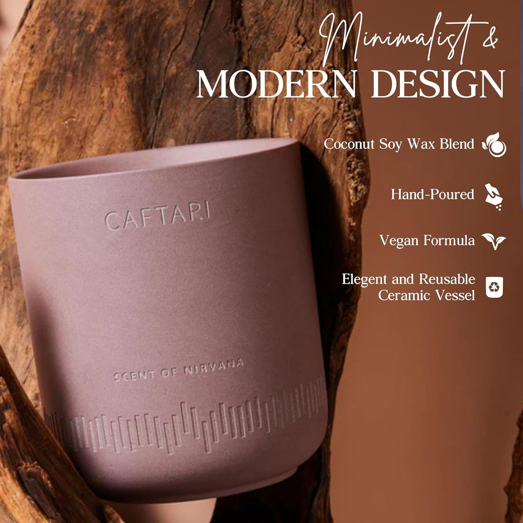 Purple candle holder with 'CAFTARI' branding against a wooden background