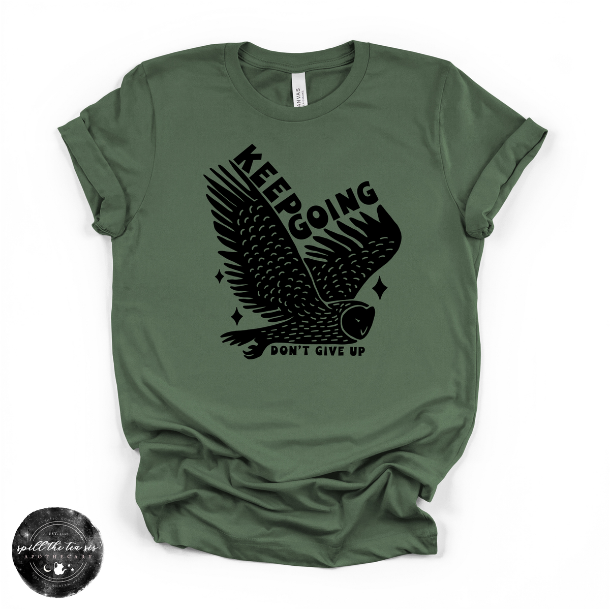 An olive green short-sleeve t-shirt with a black graphic of an owl and the text 'KEEPING DON'T GIVE UP' printed on the front, displayed flat against a white background.