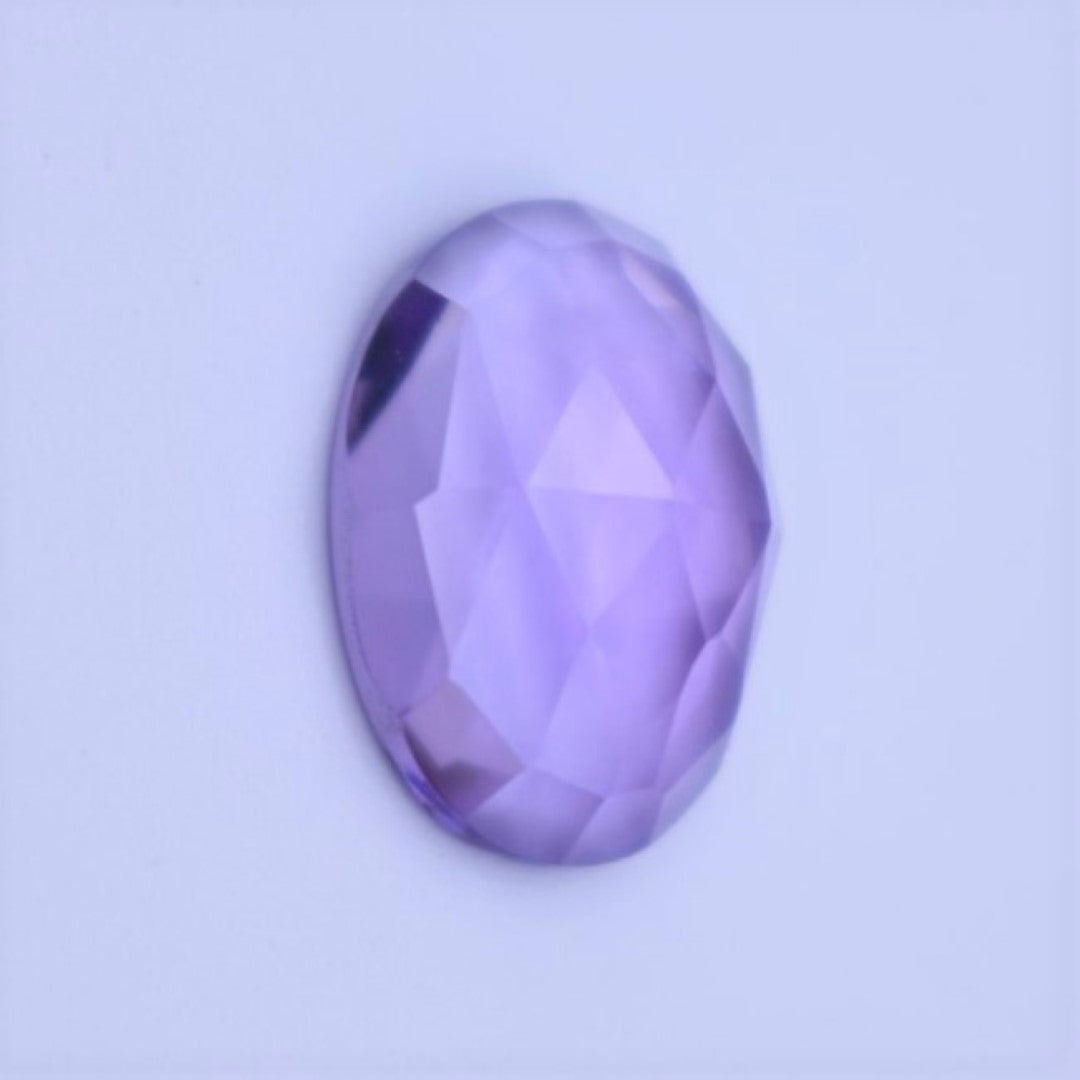 Diagonal view of a Brazilian amethyst in an elegant oval cut