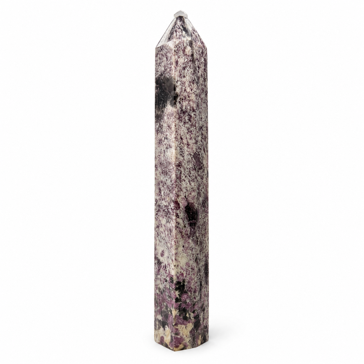 A natural quartz crystal obelisk with a pointed top, featuring a marbled pattern of purple, black, and cream-colored inclusions, set against a plain white background.