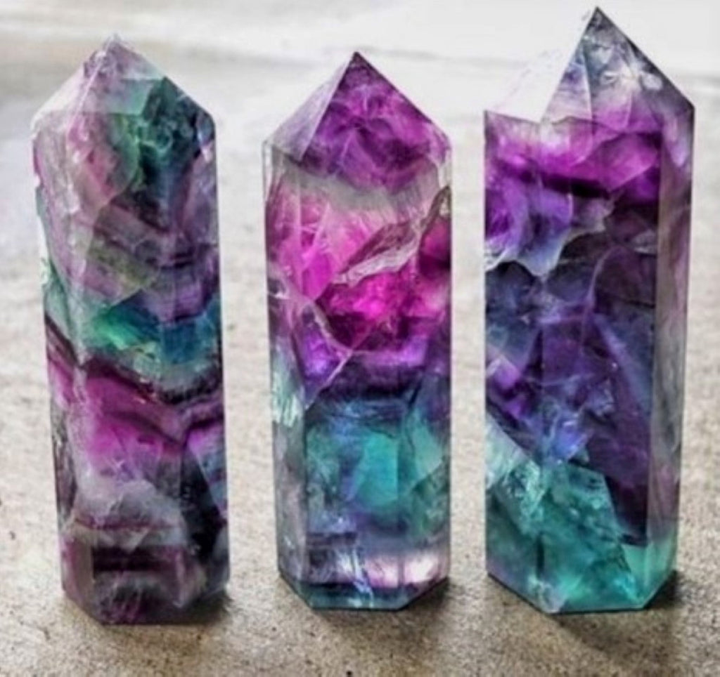 Photo of three Fluorite Crystal Obelisks.