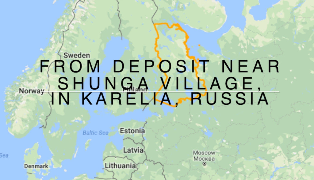 A map-style graphic highlighting a region in Karelia, Russia, with an orange outlined area near Shunga Village and large black text reading 'FROM DEPOSIT NEAR SHUNGA VILLAGE, IN KARELIA, RUSSIA.' Countries such as Sweden, Norway, Denmark, Estonia, Latvia, Lithuania, and Moscow are labeled.