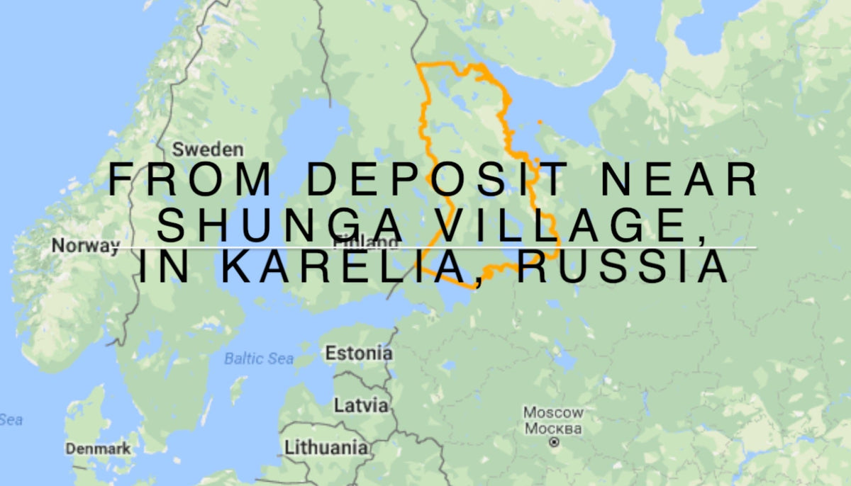 A map-style graphic highlighting a region in Karelia, Russia, with an orange outlined area near Shunga Village and large black text reading 'FROM DEPOSIT NEAR SHUNGA VILLAGE, IN KARELIA, RUSSIA.' Countries such as Sweden, Norway, Denmark, Estonia, Latvia, Lithuania, and Moscow are labeled.
