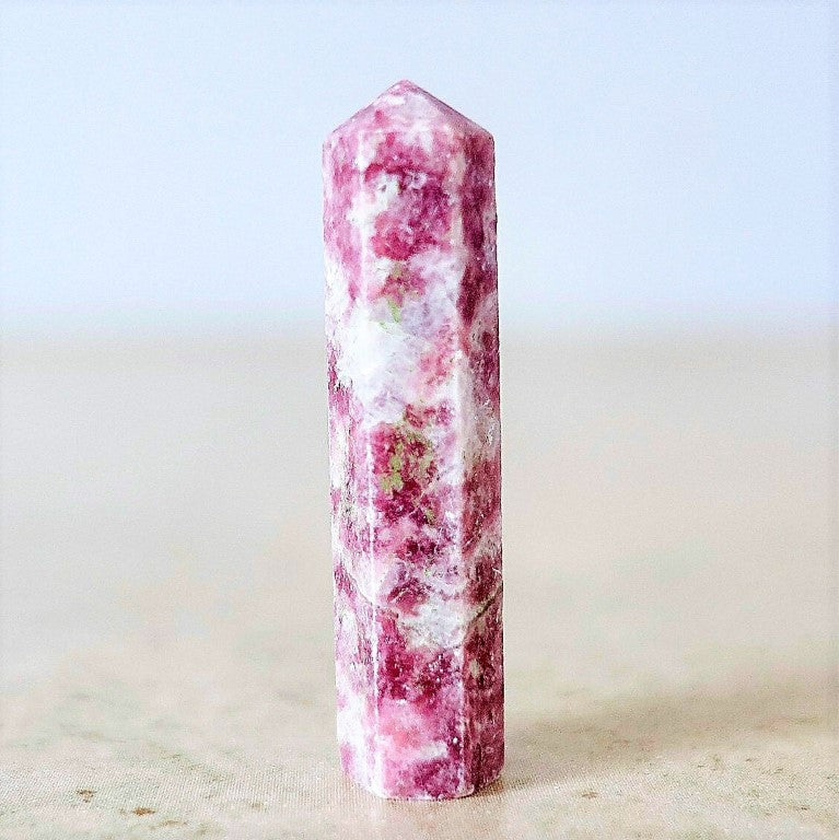 A Lepidolite Obelisk Crystal Gem wand