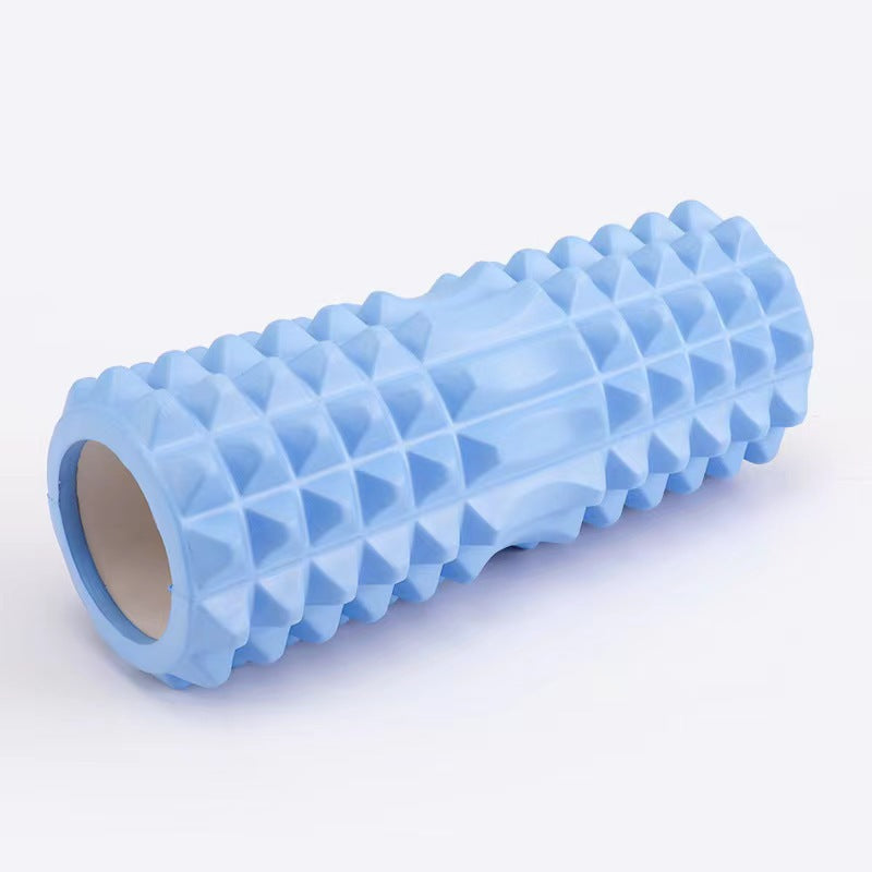 Blue foam roller with textured surface on a white background