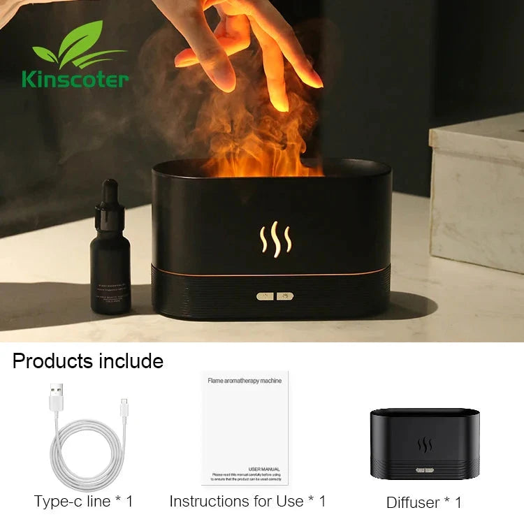 Black flame diffuser with a hand holding a glowing orange object, Kinscoter logo visible.