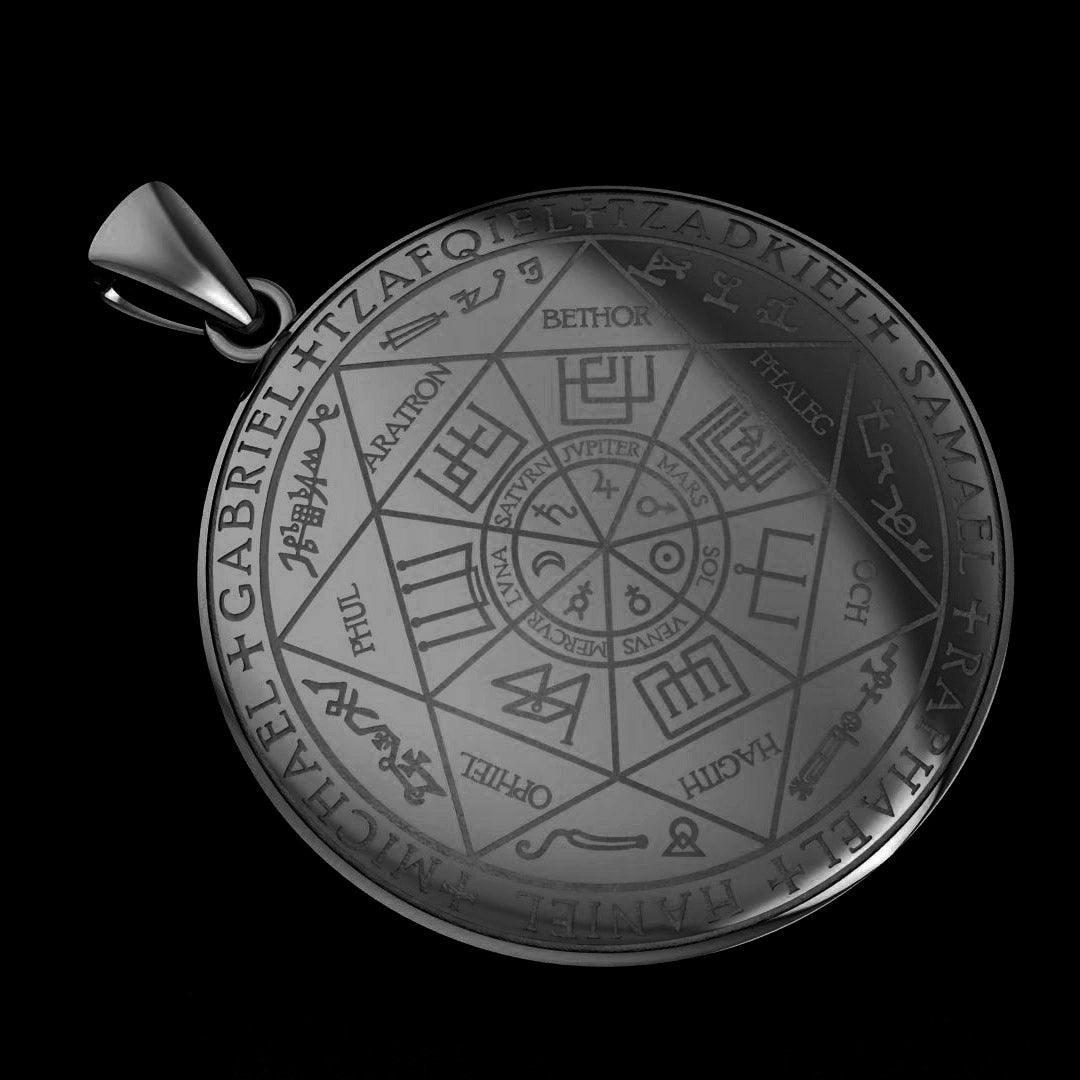 Seven Archangels Sterling Silver Pendant on a black background with dim lighting on the  pendant.