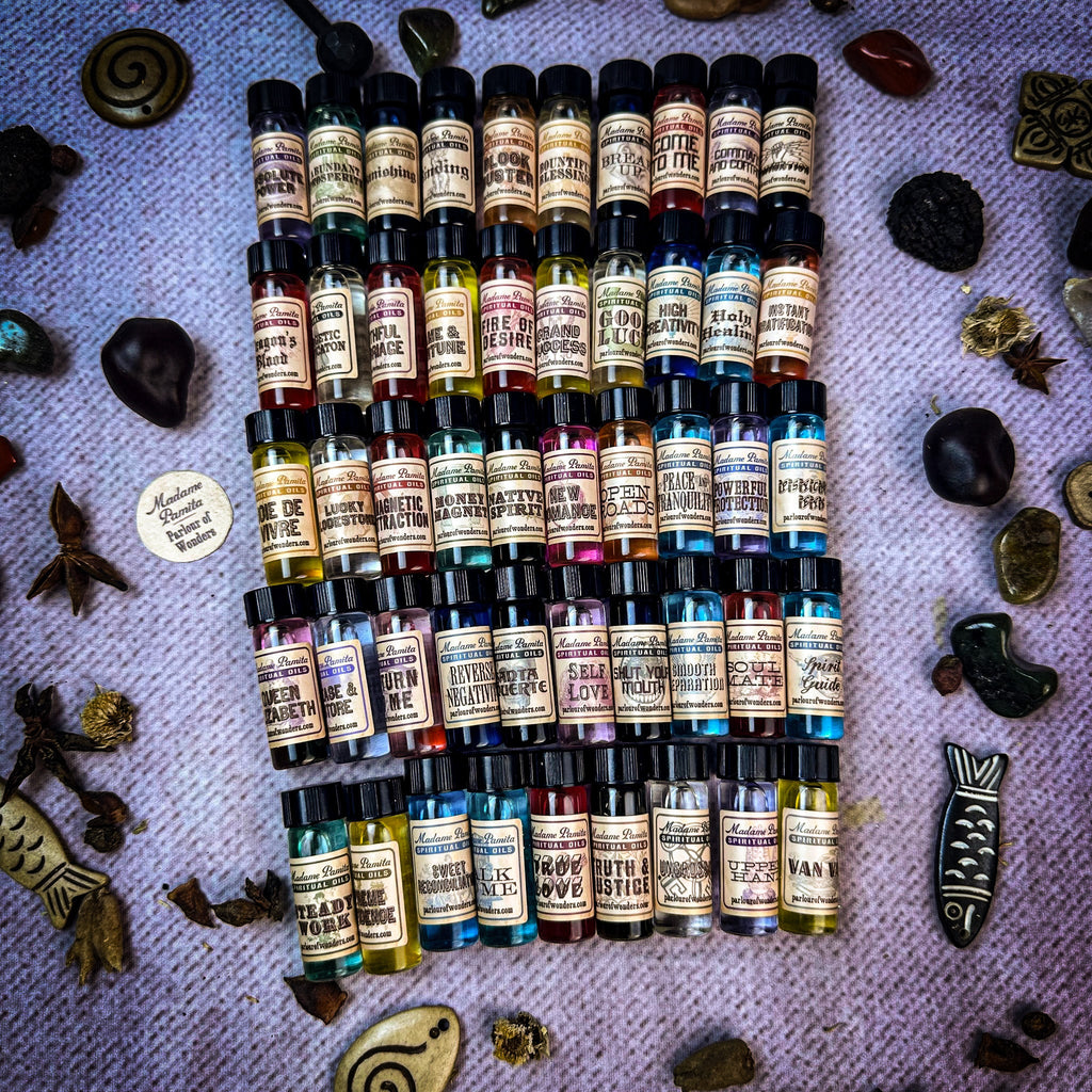 Five rows of essential oils in small bottles.
