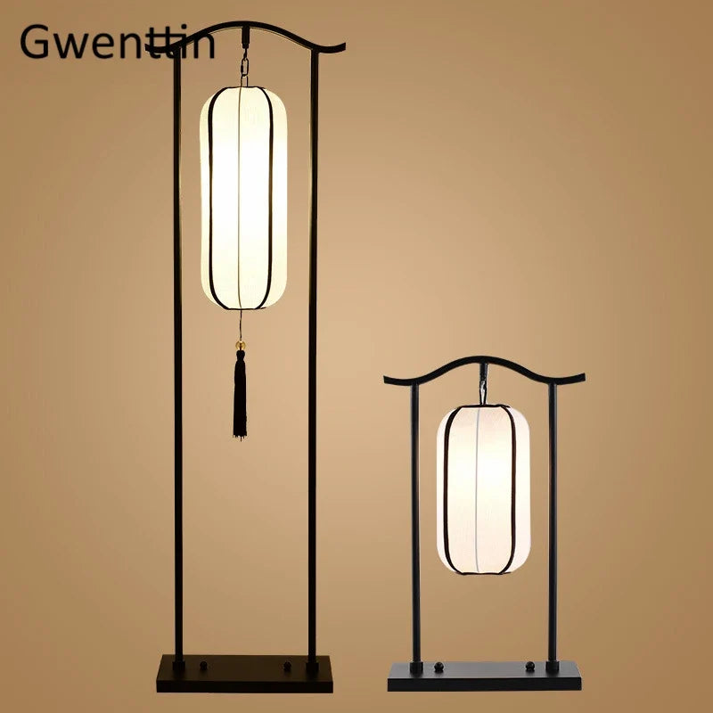 Two floor lamps with white lampshades on a beige background, featuring the brand 'Gwenttin'.