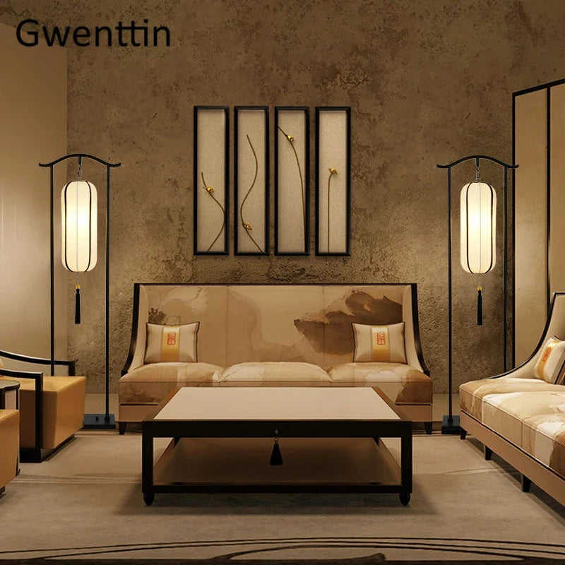 Modern living room with beige sofa, coffee table, and wall art.