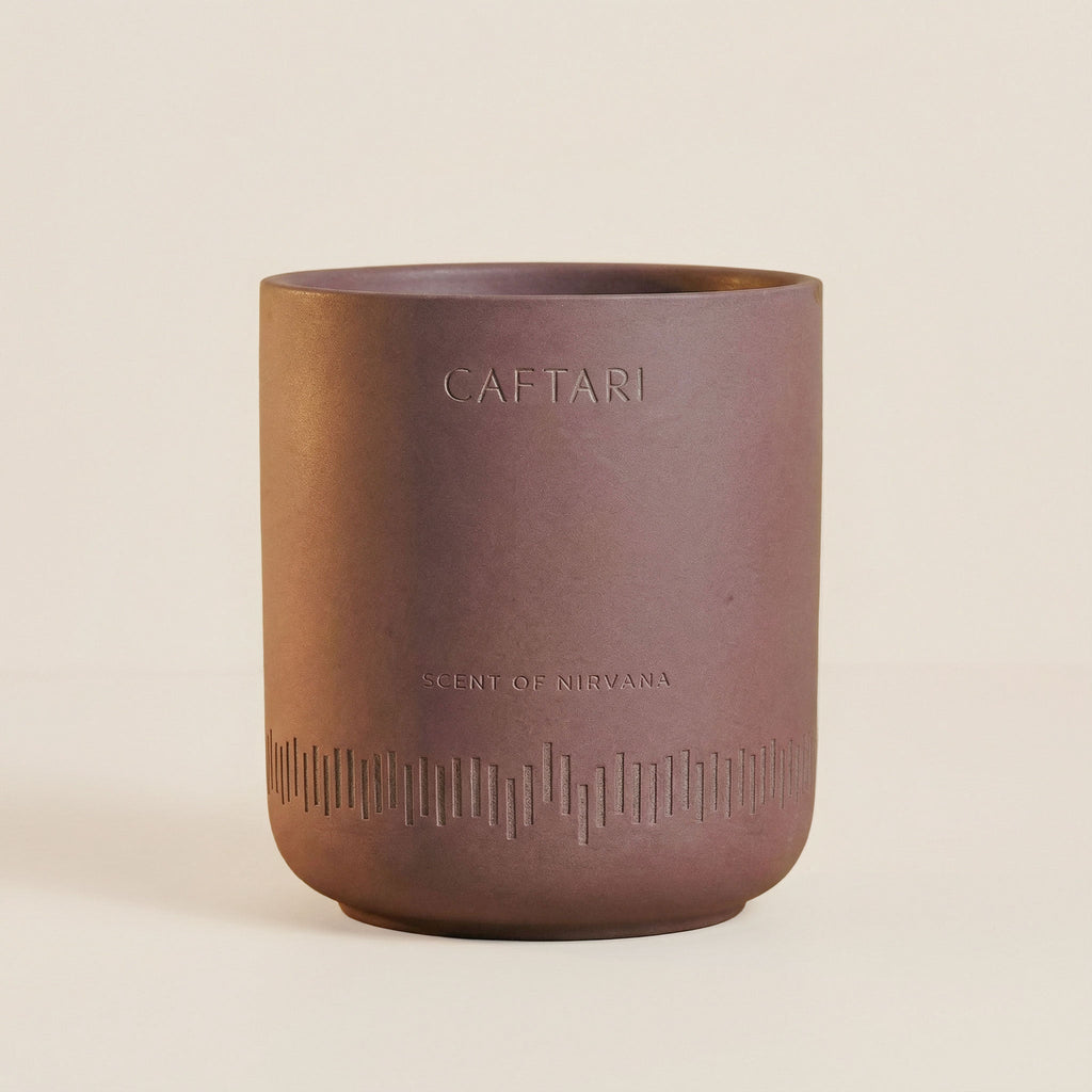 Brown ceramic pot with 'CAFTARI' branding on a beige background