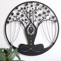 Decorative wall art in the shape of a tree with hanging chains on a white background