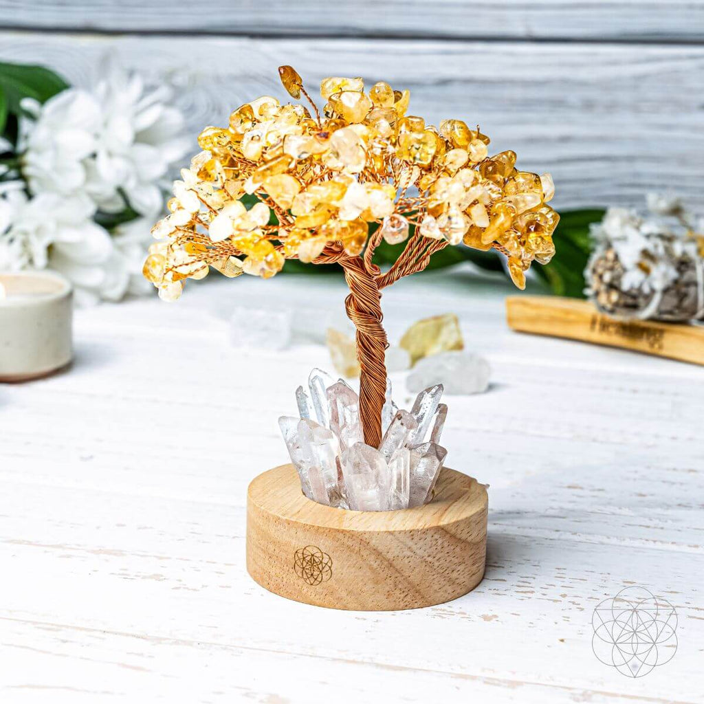 A Golden Lamp of Wealth - Citrine Tree on a white surface
