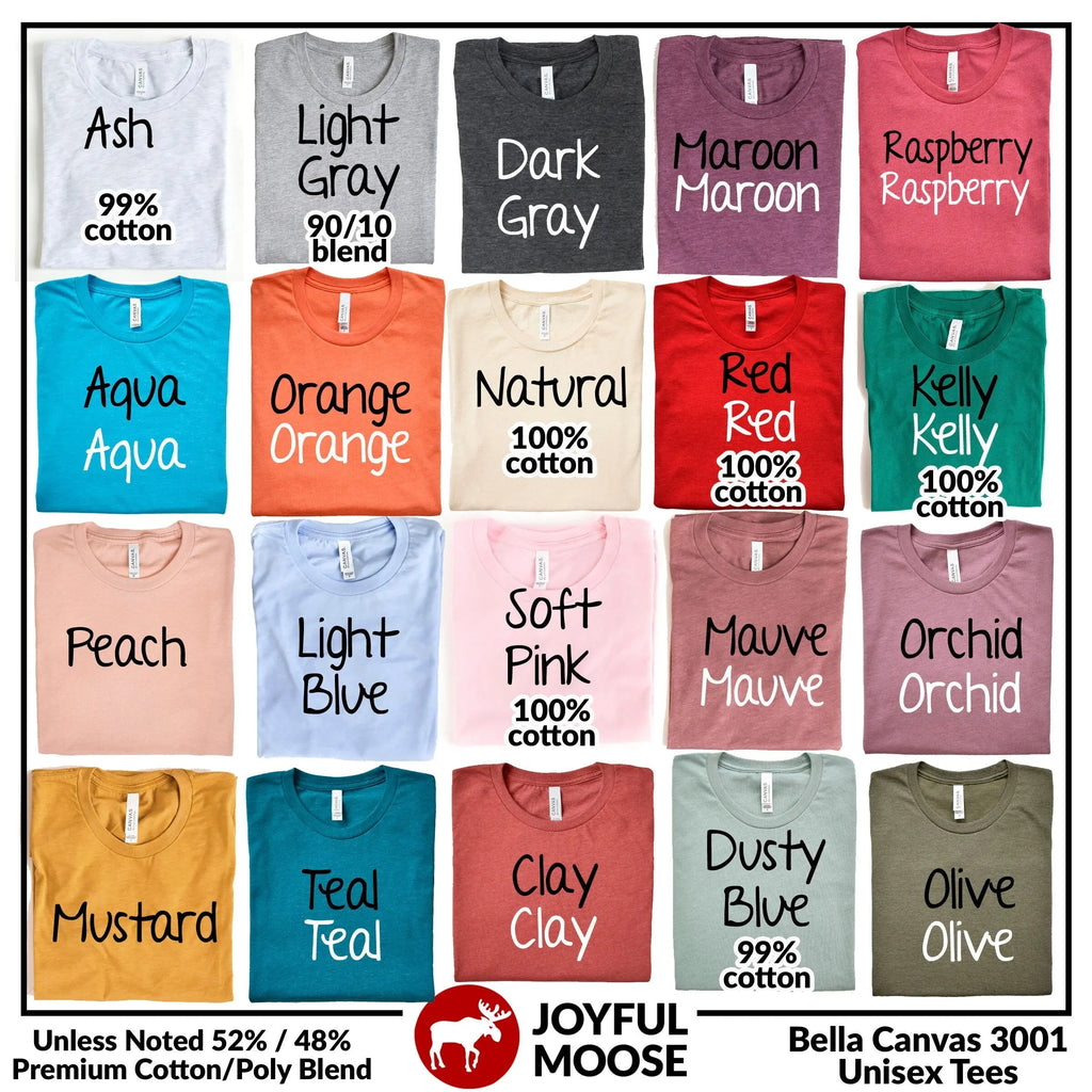 Collection of t-shirts in various colors with labels and branding information.