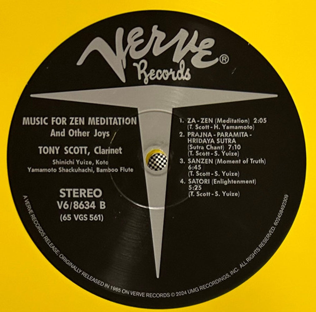A close-up of a black vinyl record label for Verve Records, featuring the title 'Music for Zen Meditation' by Tony Scott on the clarinet, with tracklist text and a bright yellow background around the circular label.