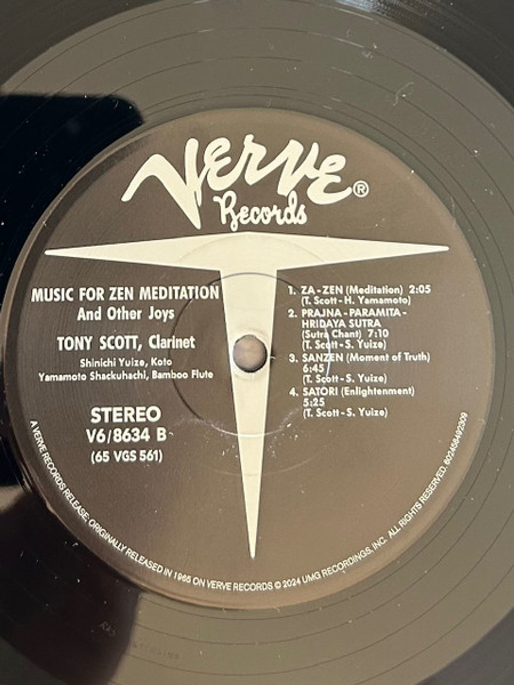 A close-up of a vintage Nerve Records vinyl record label for 'Music for Zen Meditation and Other Joys' by Tony Scott, clarinet, released in 1965.