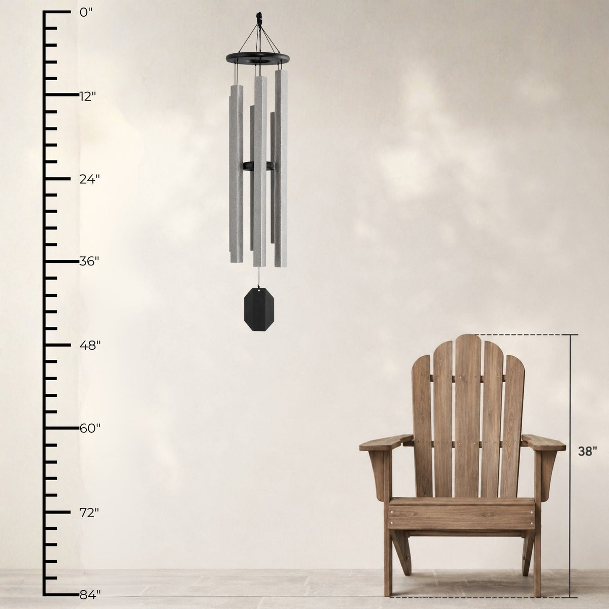 Wind chime and Adirondack chair with measurement scale on a light background