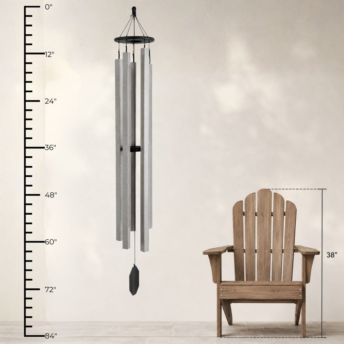 Wind chime next to a wooden chair with measurement indicators on a plain background