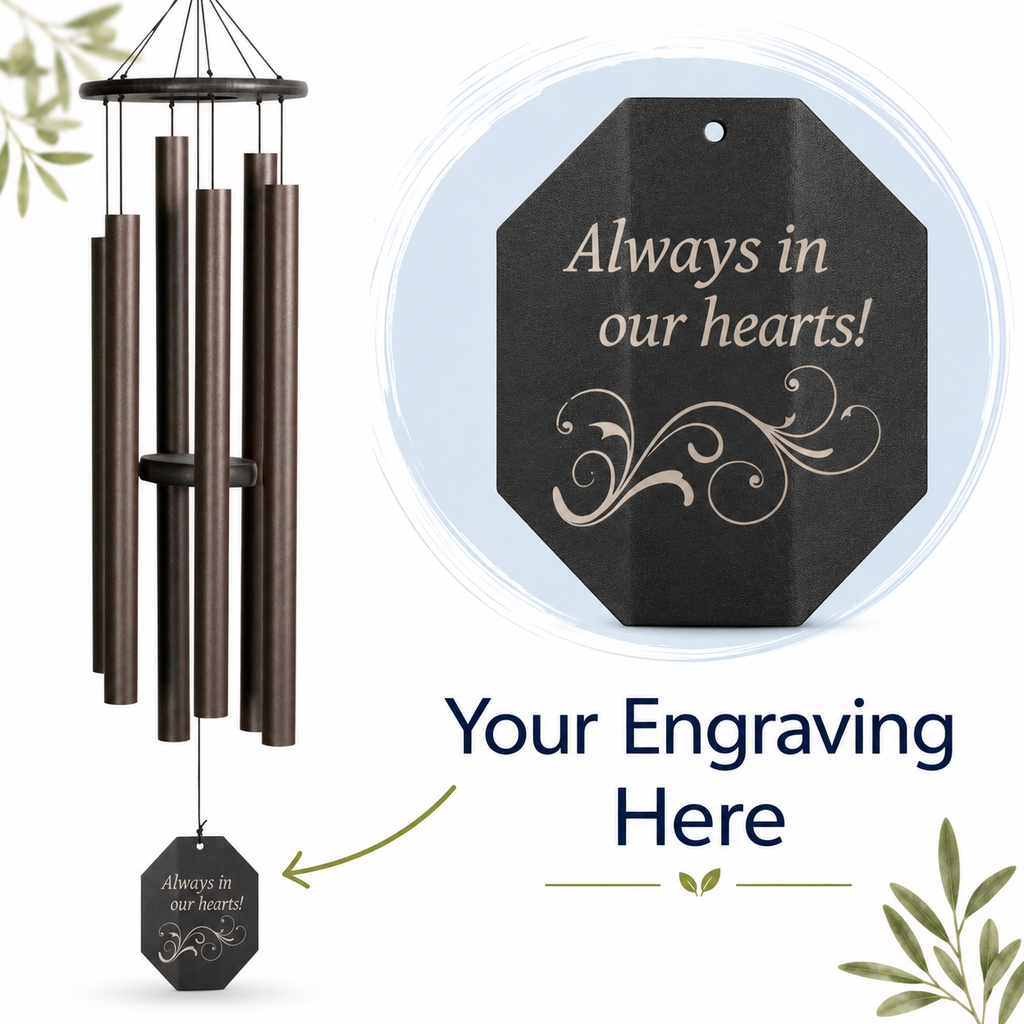 Decorative wind chime with engraved message on a white background