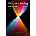 Book cover of 'Vibrational Healing through the Chakras' by Joy Gardner with a colorful light design.