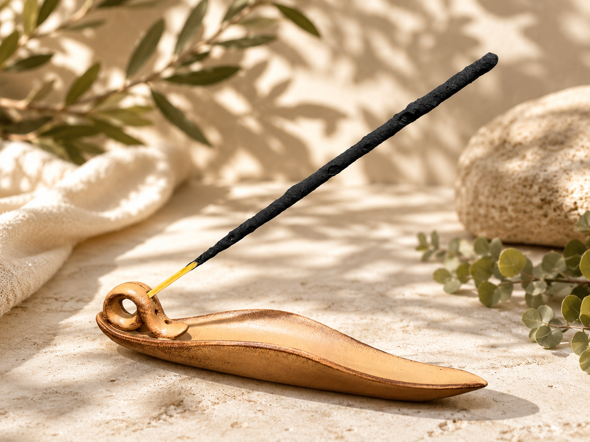 Incense burner shaped like a leaf.