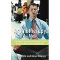 Book cover for 'Aromatherapy for Men' by Judith White and Karen Downes, featuring a man in a light blue shirt and red tie sitting cross-legged against a blurred background.