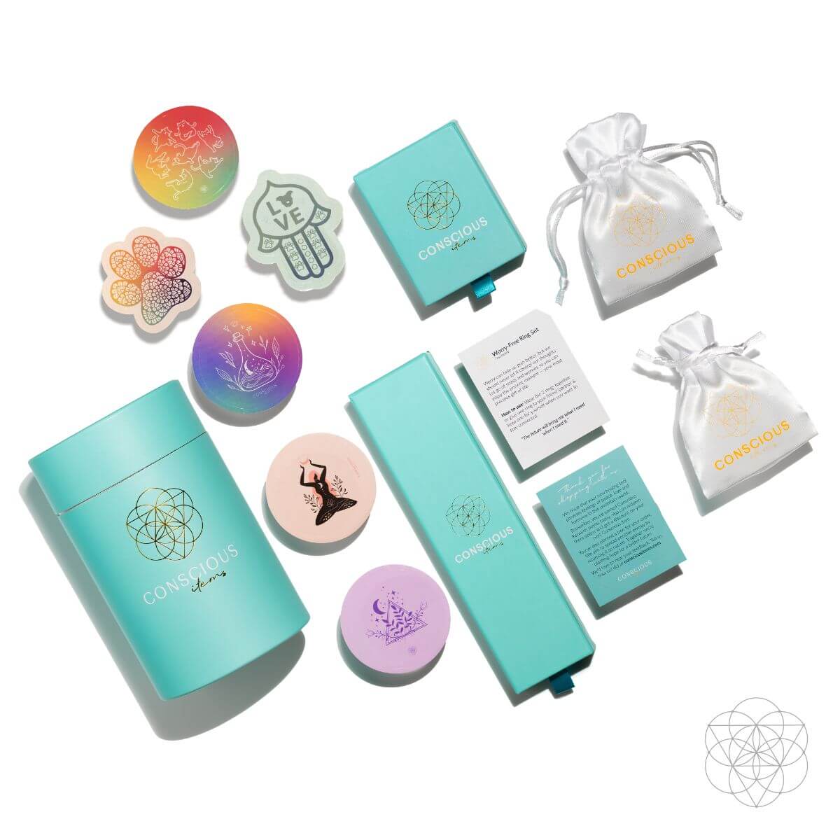Collection of colorful items including notebooks, cards, and pouches with a brand logo on a white background.