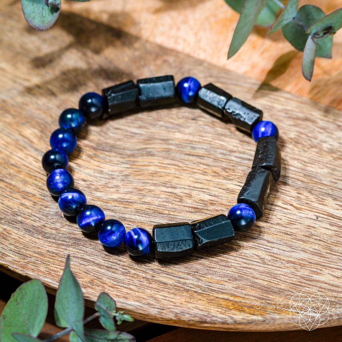 The Aura Protection Bracelet, crafted from Blue Tiger's Eye and Black Tourmaline