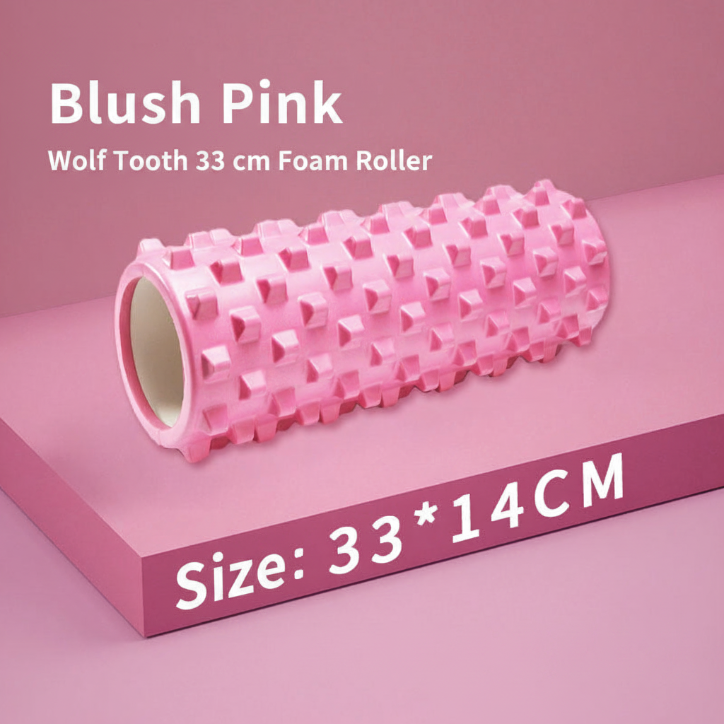 A pink foam roller with textured nubs, labeled 'Blush Pink' and 'Wolf Tooth 33 cm Foam Roller,' resting on a pink platform with text reading 'Size: 33 * 14CM.'.